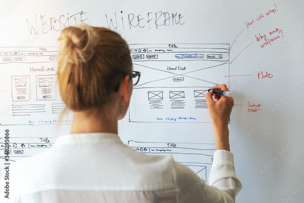 Poster ui ux designer drawing new website wireframe