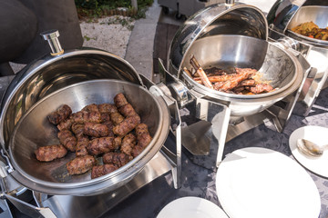 Live food stations. Kitchenware in the line catering summer brunch buffet. Corporate cocktail event