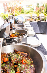 Live food stations. Kitchenware in the line catering summer brunch buffet. Corporate cocktail event