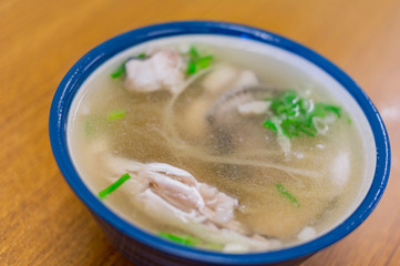 Close up of a bowl of delicious fish soup