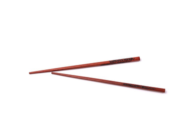 brown wooden chopsticks on the white background