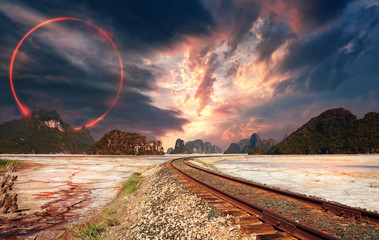 Fantasy landscape and red circle in the sky mate painting