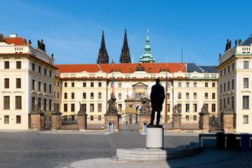 Naklejka premium Hradcany square with entrance gate to Prague Castle and statue of Tomas Garrigue Masaryk - the first President of Czechoslovakia, Praha, Czech Republic