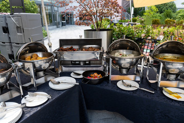 Live food stations. Kitchenware in the line catering summer brunch buffet. Corporate cocktail event