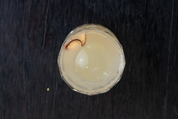 Ginger Cocktail with ice in glass cup