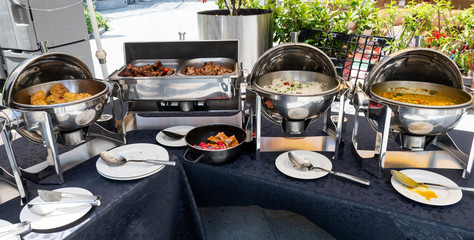 Live food stations. Kitchenware in the line catering summer brunch buffet. Corporate cocktail event