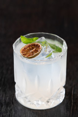 Cup of glass with lime and mint