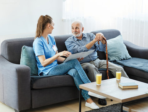 nurse doctor senior care brochure showing caregiver help assistence retirement home nursing elderly man