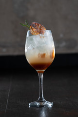Cocktail with rosemary and orange
