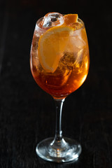 Orange cup with summer cocktail