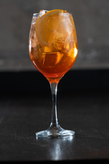 Orange cup with summer cocktail