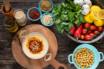 Hummus (Middle East food) on the table with top view.