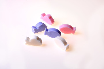 Fototapeta premium Multi-colored soap pieces isolated on white background