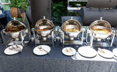Live food stations. Kitchenware in the line catering summer brunch buffet. Corporate cocktail event