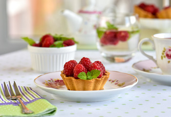 Fruit raspberry cakes on a table