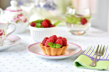 Fruit raspberry cakes on a table