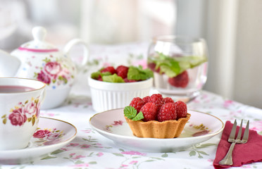 Fruit raspberry cakes on a table