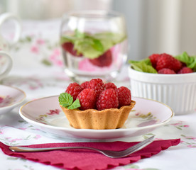 Fruit raspberry cakes on a table