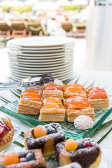 Candy bar food buffet by the pool, during hotel brunch, catering in the garden, food bloggers event