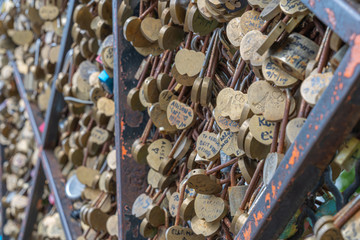 Paris, France - 05 09 2020: Montmartre district. Grid full of lovers' padlocks, during confinement...