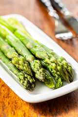 Cooked green asparagus. Healthy seasonal vegetable.