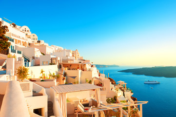 White architecture on Santorini island, Greece. Panoramic view at sunset. Famous travel destination