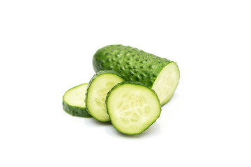Sliced fresh cucumber isolated on the white background.