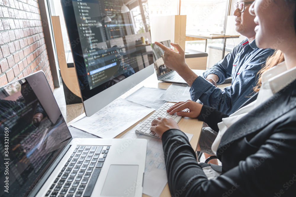 Aufkleber Programmers cooperating at Developing programming and website working in a software develop company office, writing codes and typing data code, Programming with HTML, PHP and javascript
