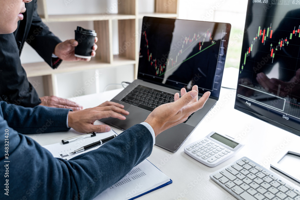 Poster business team partner working with computer, laptop, discussion and analyzing graph stock market tra