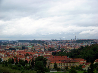 Fototapeta premium The Prague panorama with many famous city sights, historic architecture, red roof