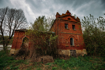 Fototapeta premium Old abandoned red brick mansion. Former Bikovo manor, Lipetsk region