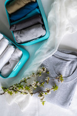 Wardrobe order. Everything on its place in boxes. Closet organized. Capsule wardrobe. Spring...