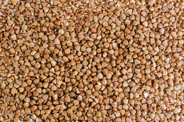 Dried Buckwheat porridge on a white isolated background