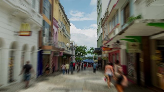 Hyperlapse of people walking in a busy commercial street