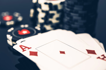 Deck Of Cards With Ace On Top And Stack Of Poker Chips.