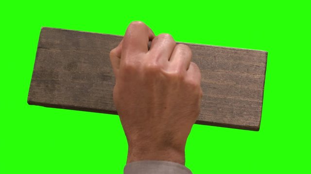 Close up of a man using an extra large rubber stamp. Add anything you want underneath like "approved" or "rejected"
