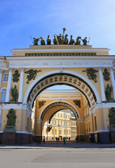 Fototapeta na wymiar Arch of General Staff Building on Palace Square in Saint Petersburg, Russia. Symmetrical building architecture, triumphal arch designed by C. Rossi on Saint Petersburg main square, close up view