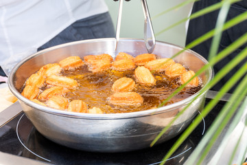 Candy bar food buffet by the pool, during hotel brunch, catering ,Chef live pancakes cooking station