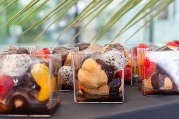 Candy bar food buffet by the pool, during hotel brunch, catering in the garden, food bloggers event