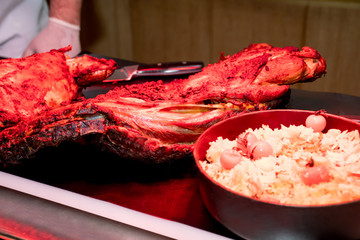 Lamb leg chop shank meat roasted for Easter celebration during festive brunch buffet
