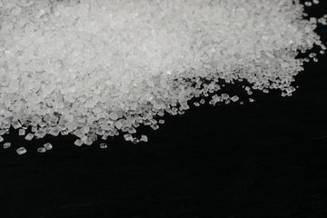 Big Sugar Crystals or Sucrose Crystals on Black Background
