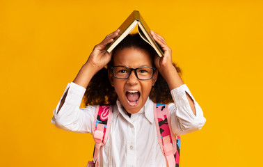 Angry School Girl Shouting Tired Of Homework, Studio Shot