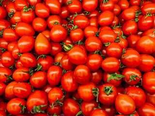lots of ripe red tomatoes to eat like a background