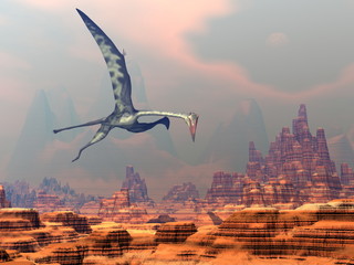 Quetzalcoatlus flying upon a canyon by beautiful sunset - 3D render © Elenarts