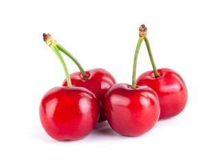 Fresh sweet cherries isolated on white background