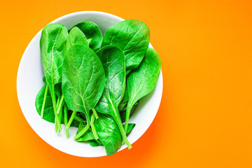 spinach petals, fresh green vegetables grass microgreen Menu concept, food background, keto or paleo diet top view. copy space for text