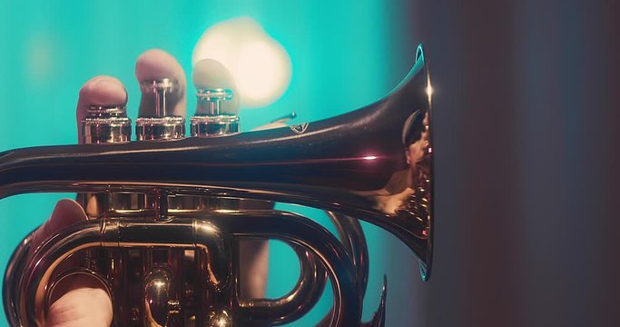 Musician playing and recording on Trumpet at home studio. Jazz, Blues, Rock, Pop Music style. Artist hobby, Create own melodies and songs, learning online. 4K video.