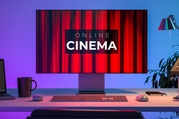 Modern PC With App For Online Movies Watching. The Cinema Inscription With Theatre Red Velvet Curtains Background on Monitor. 3d Rendering