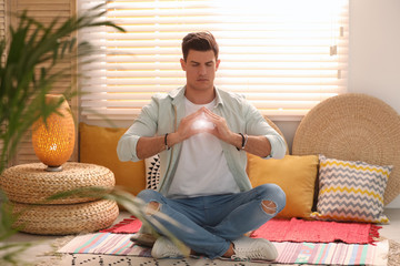 Man during self-healing session in therapy room