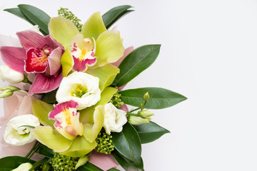 Orchid tropical flowers, romantic bouquet of orchids for copy space